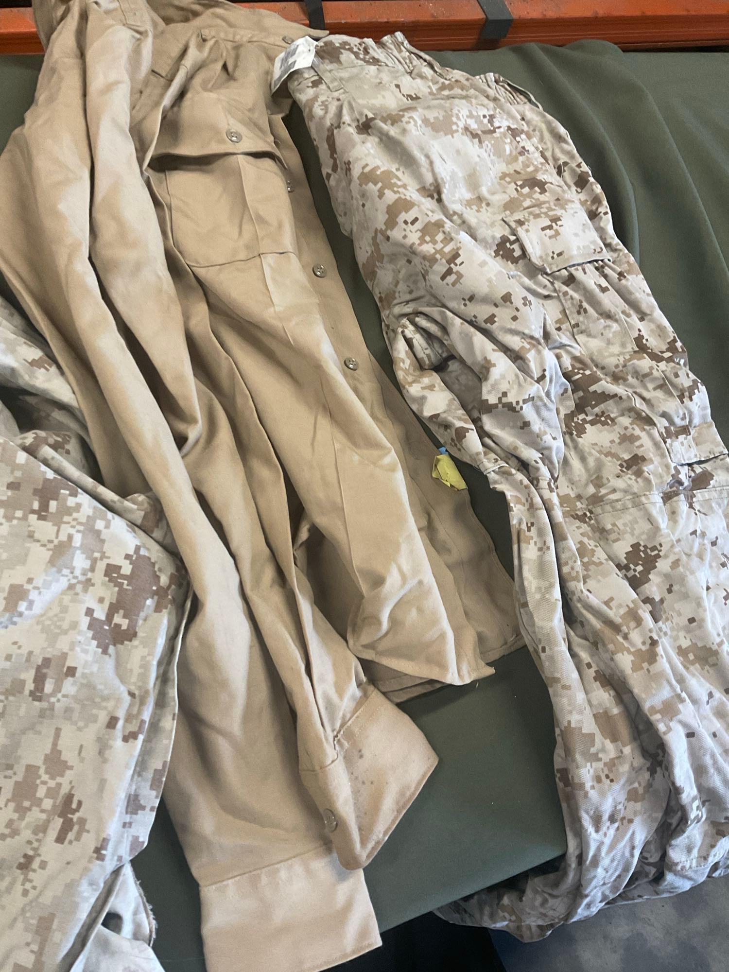 Large rolling bag, with tags all weather coat 42R, coat 44xs with pants 33s, with tags coat 40r, 42L