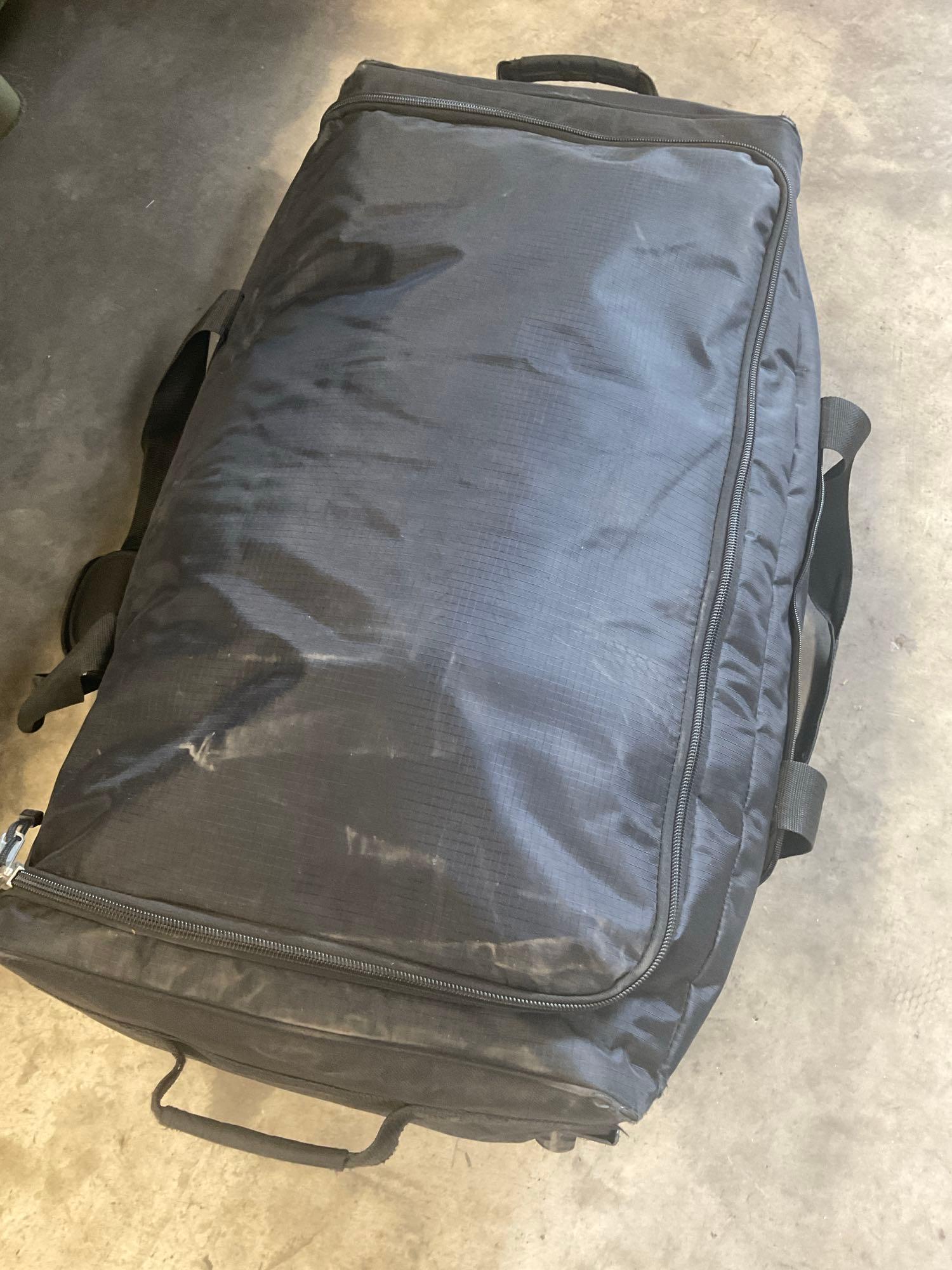 Large rolling bag, with tags all weather coat 42R, coat 44xs with pants 33s, with tags coat 40r, 42L