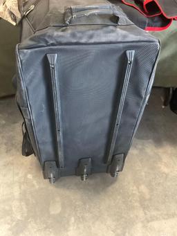 Large rolling bag, with tags all weather coat 42R, coat 44xs with pants 33s, with tags coat 40r, 42L