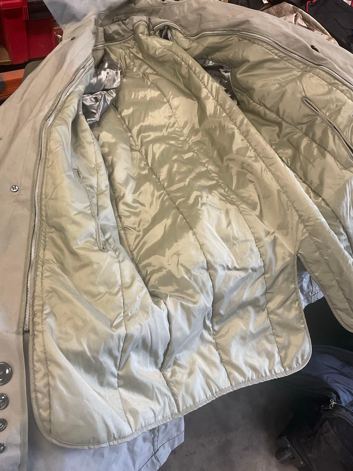 Large rolling bag, with tags all weather coat 42R, coat 44xs with pants 33s, with tags coat 40r, 42L