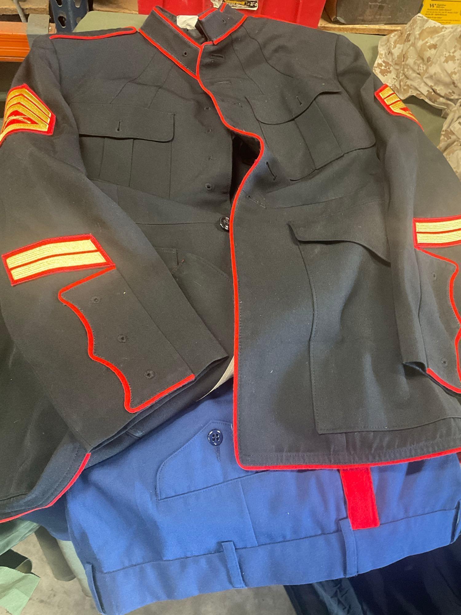 Large rolling bag, with tags all weather coat 42R, coat 44xs with pants 33s, with tags coat 40r, 42L