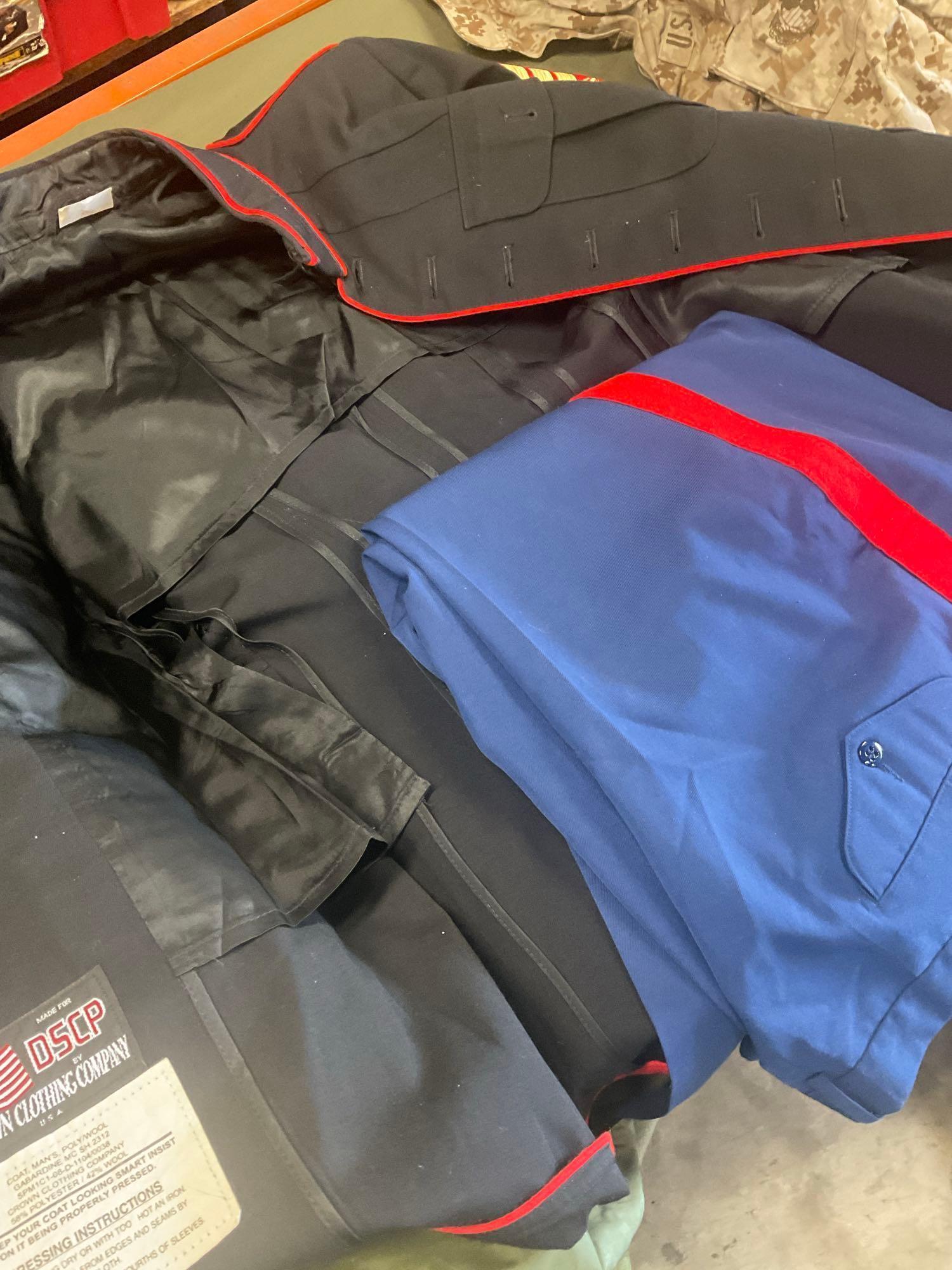 Large rolling bag, with tags all weather coat 42R, coat 44xs with pants 33s, with tags coat 40r, 42L