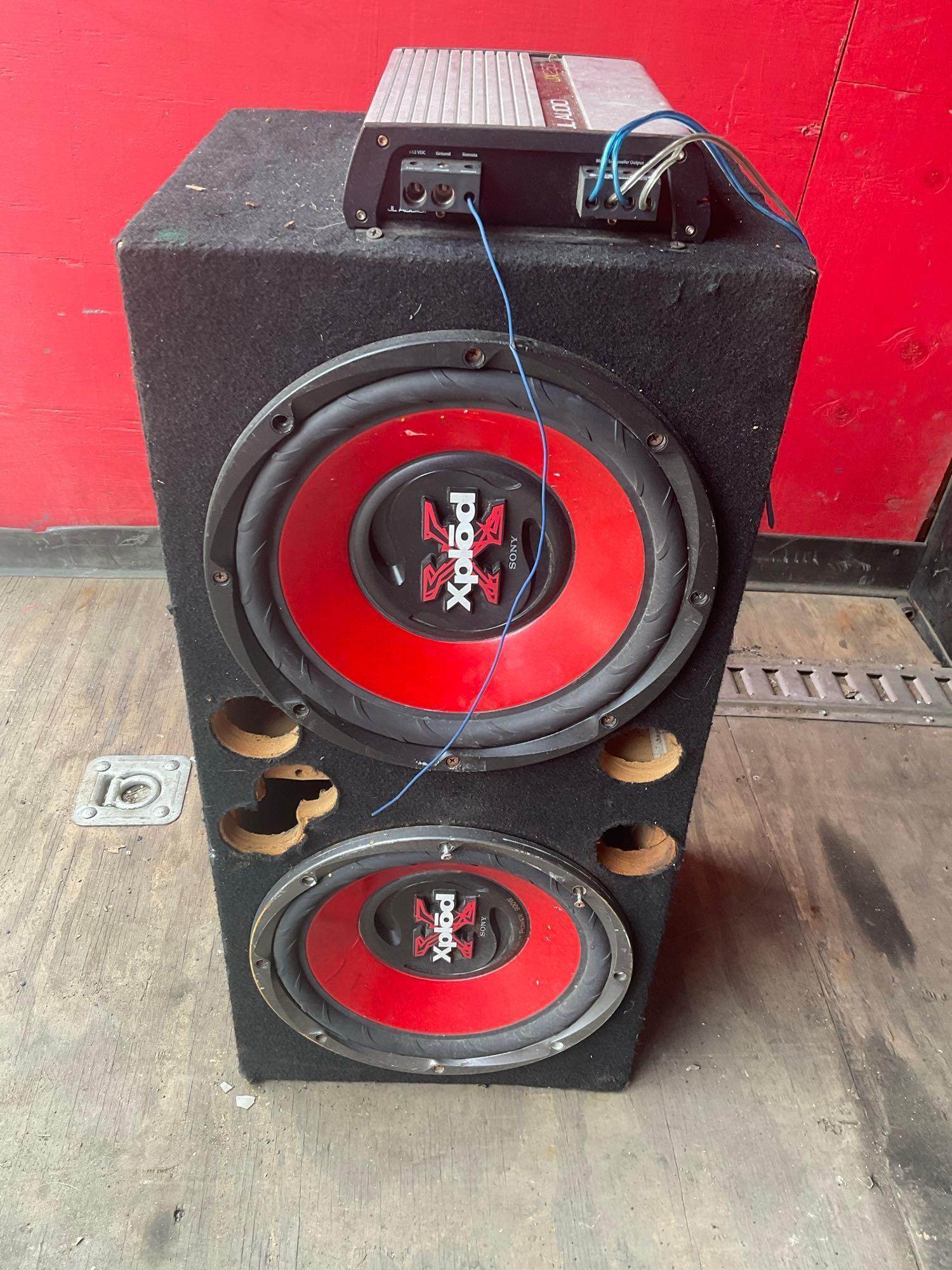 12" dual Sony Xplod subwoofer with JL Audio JX250/1 amplifier. Box 30" x 13" x 14"