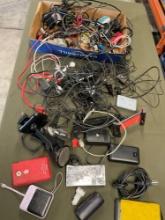 Large lot of assorted cables, cell phone carriers, charging cables, etc. Over 40 pieces