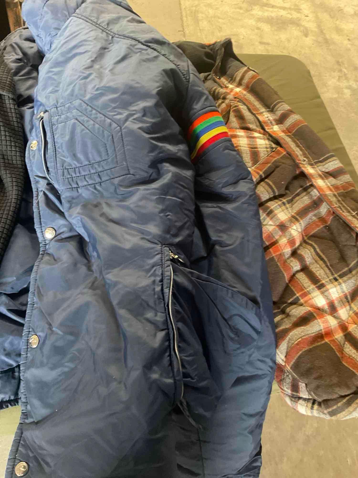 Assorted jackets.Tmberland, Tommy Hilfiger, Fried Denim,etc. see pics for some sizes. 12 pieces