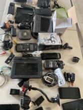 Assorted items. Chargers, adapters, controls, battery tester, mounts, etc. 48 pieces