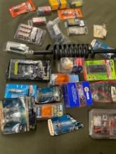 Vehicle part/ items majority new. Plugs, disconnects m bolt set, lights, cap, fuel filter, etc. 26
