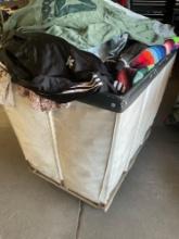 Large lot of Men's/ woman's/ bedding. Shirts, dresses, pants, jackets, etc Over 100 pieces