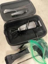 Barbados shaver turned on, Manscaoed no cords shaver, assorted attachments