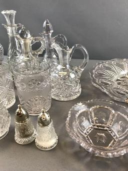 Group of clear pressed glass cruets and more