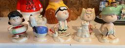 Group of five Lenox Peanuts beach party porcelain figurines