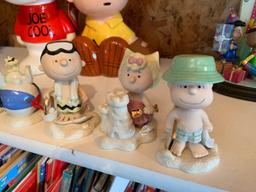 Group of five Lenox Peanuts beach party porcelain figurines
