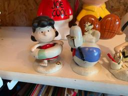 Group of five Lenox Peanuts beach party porcelain figurines