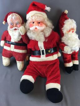 Group of Santa Plush Dolls