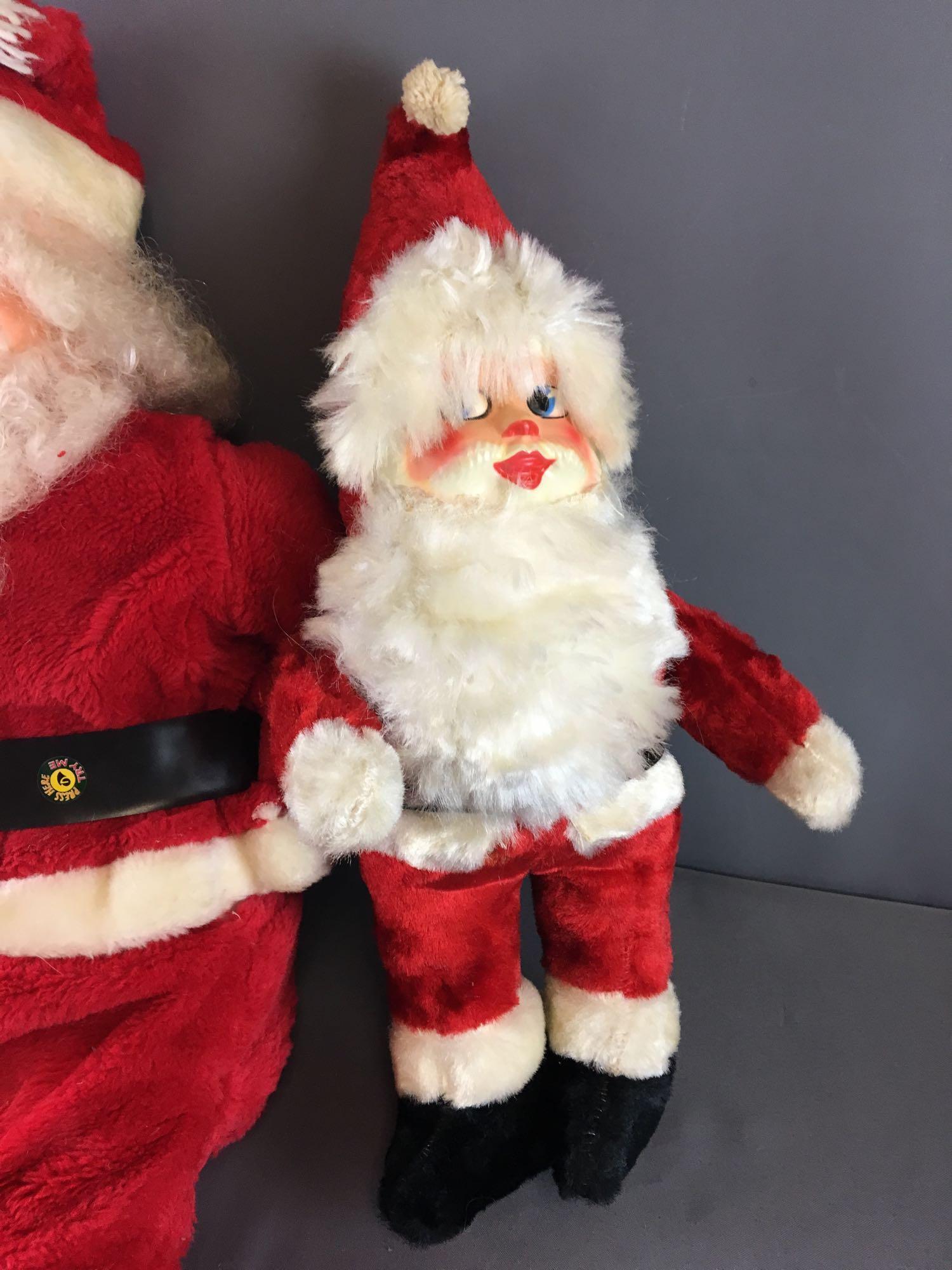 Group of Santa Plush Dolls
