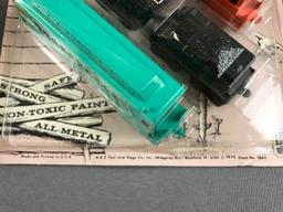 Group of 2 Vintage midgeToy train sets in original packaging