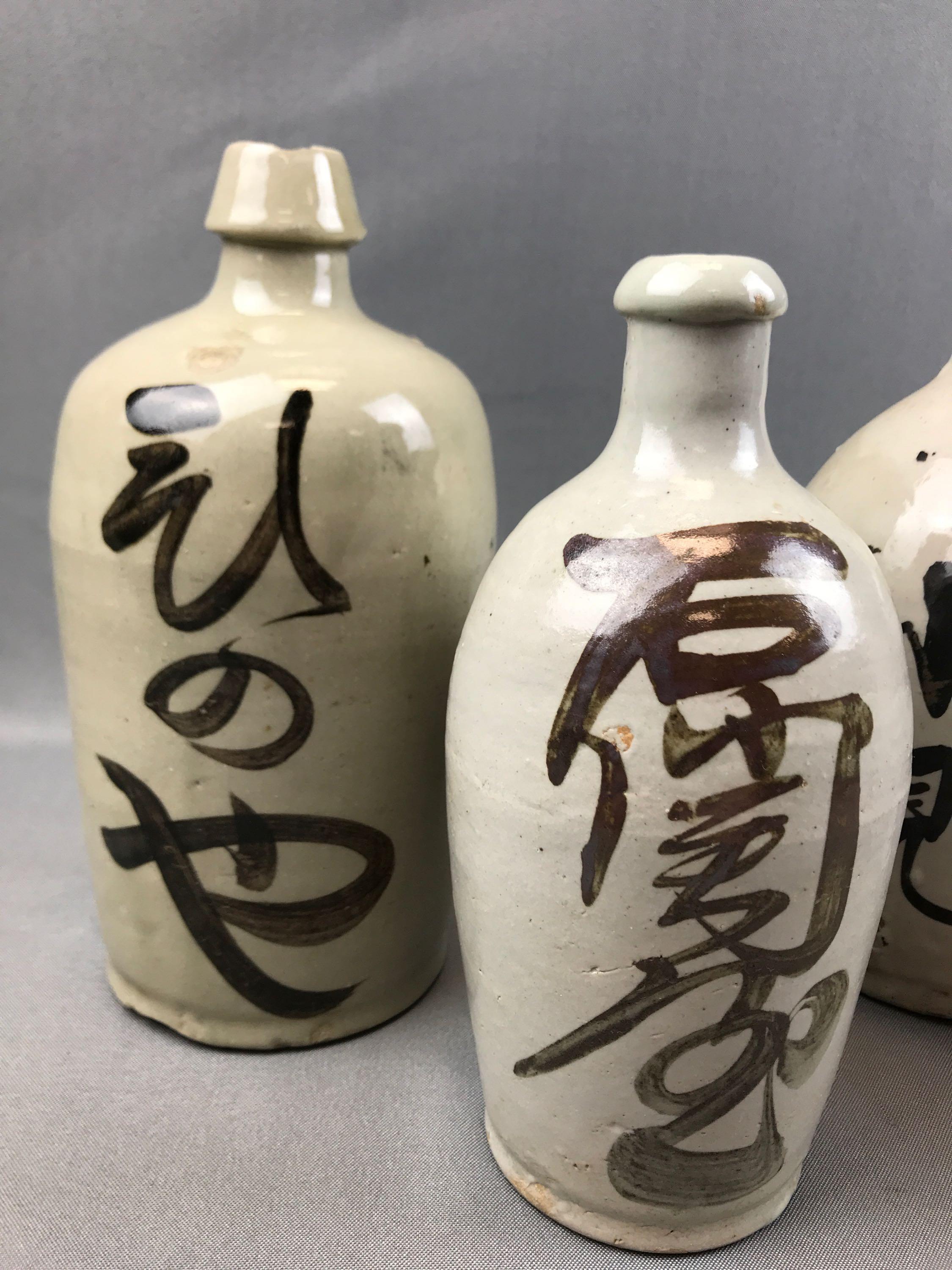 Group of 4 : Antique Asain Sake Stoneware Jugs