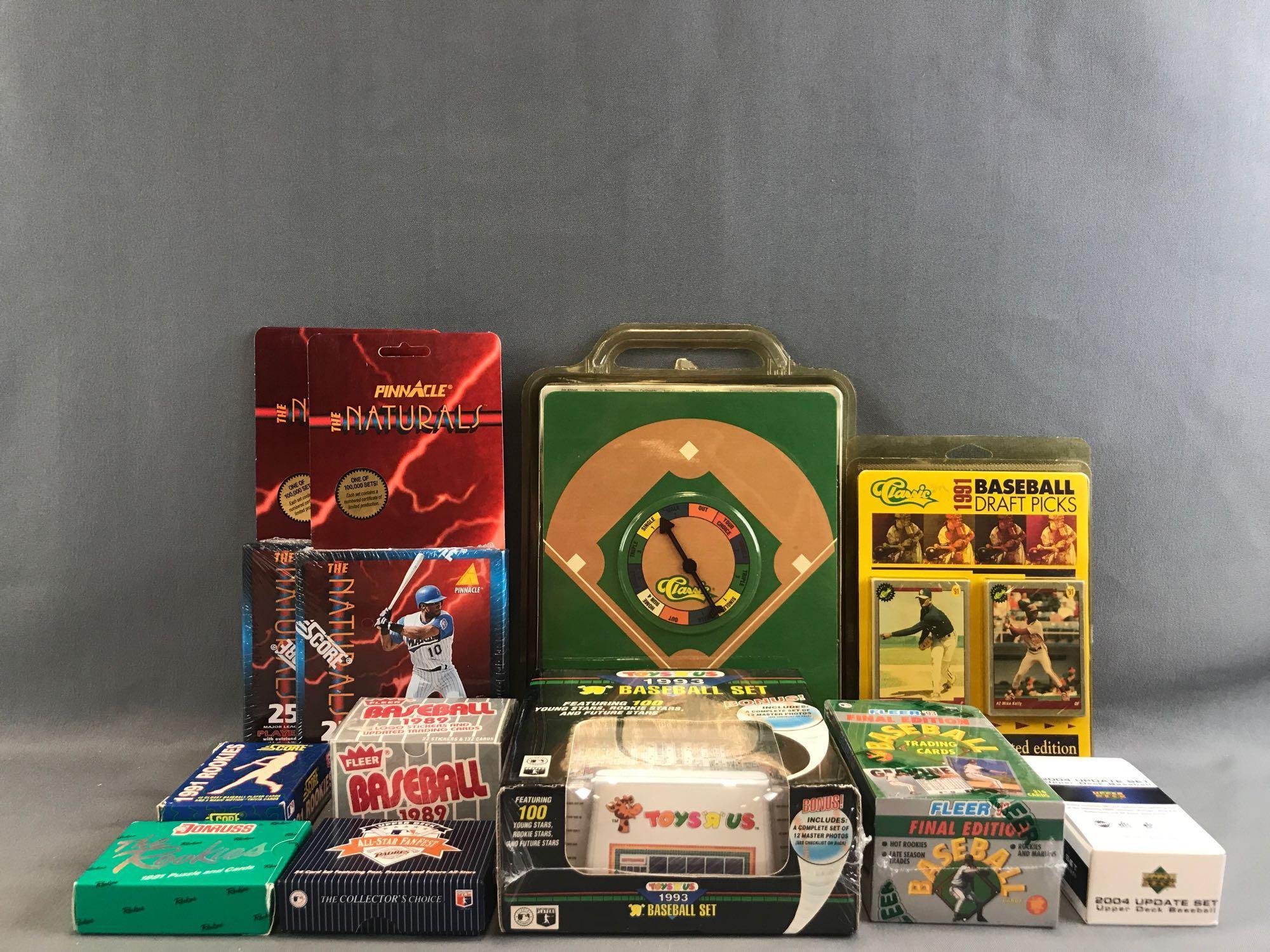 Group of 11 pieces assorted MLB card sets, game