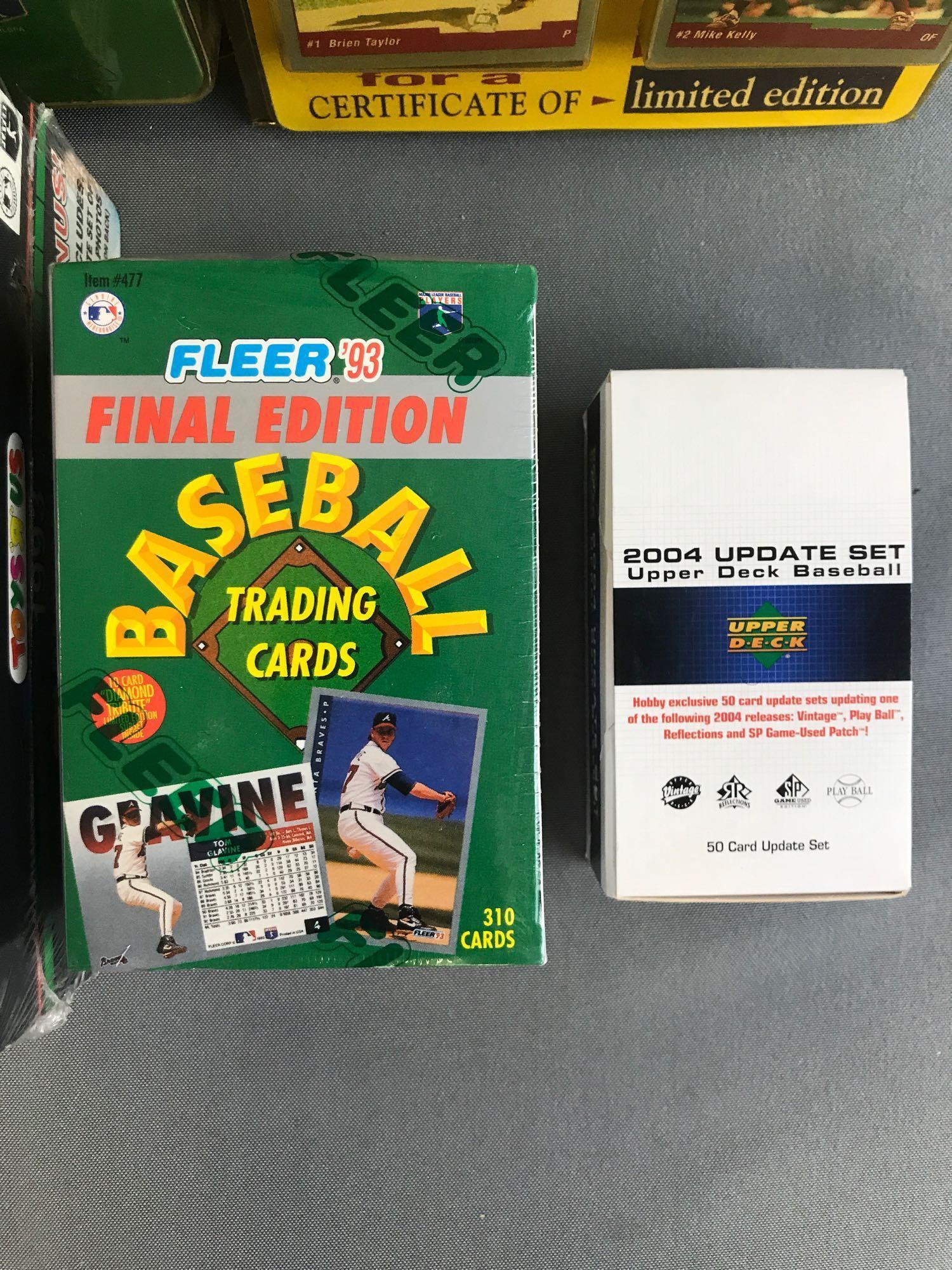 Group of 11 pieces assorted MLB card sets, game