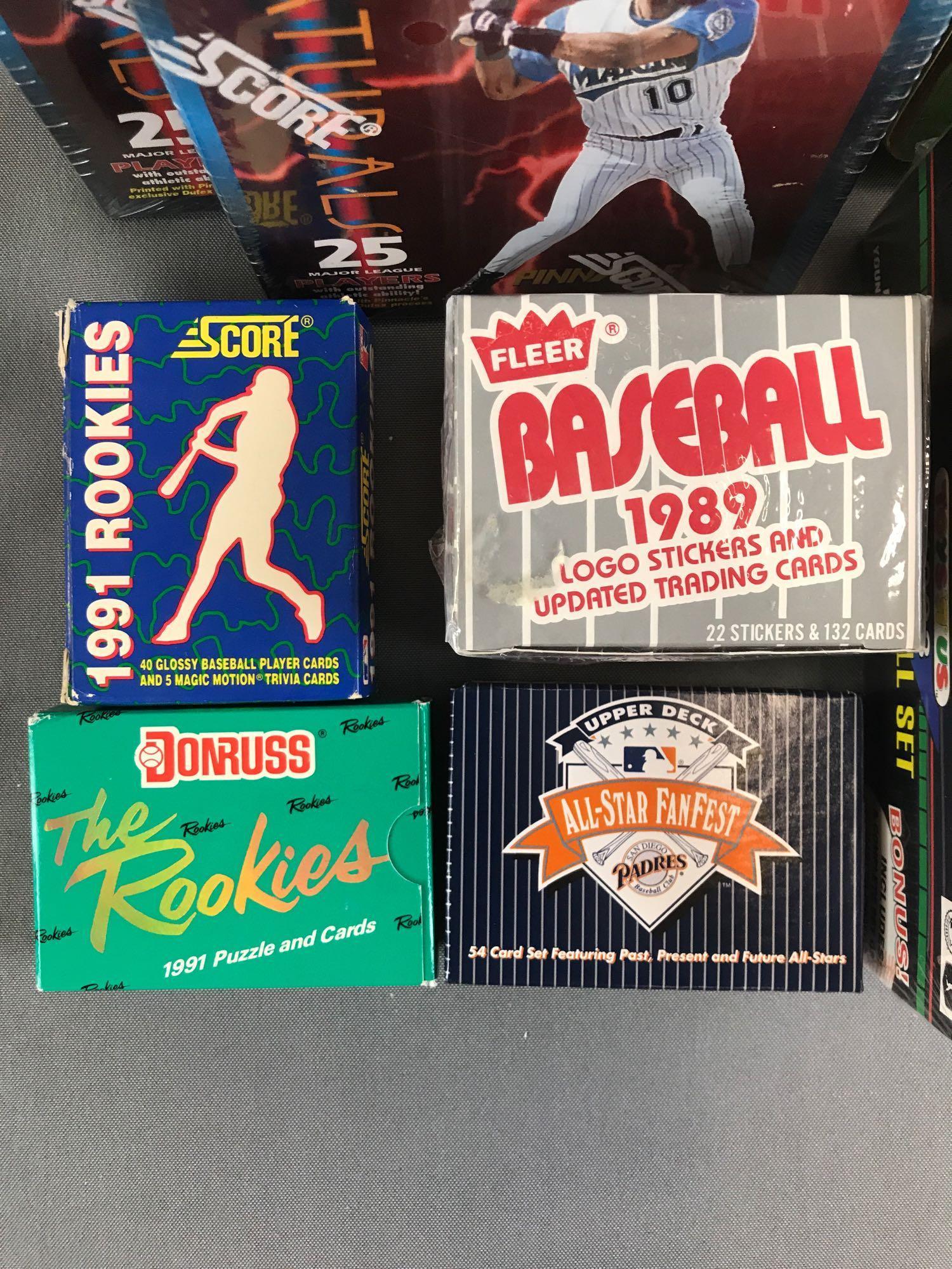 Group of 11 pieces assorted MLB card sets, game