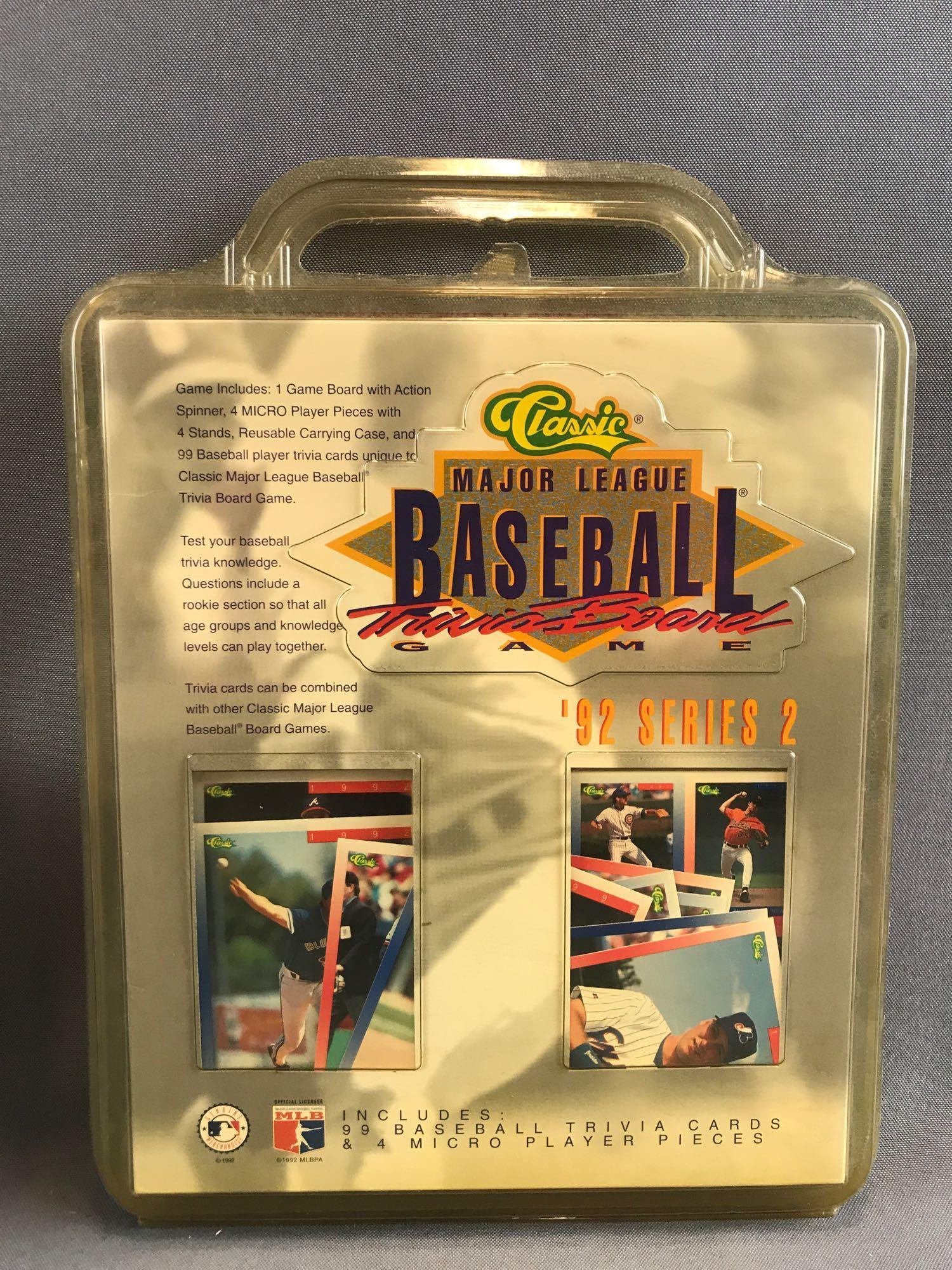 Group of 11 pieces assorted MLB card sets, game