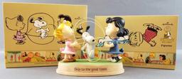 2 Peanuts Hallmark figurines