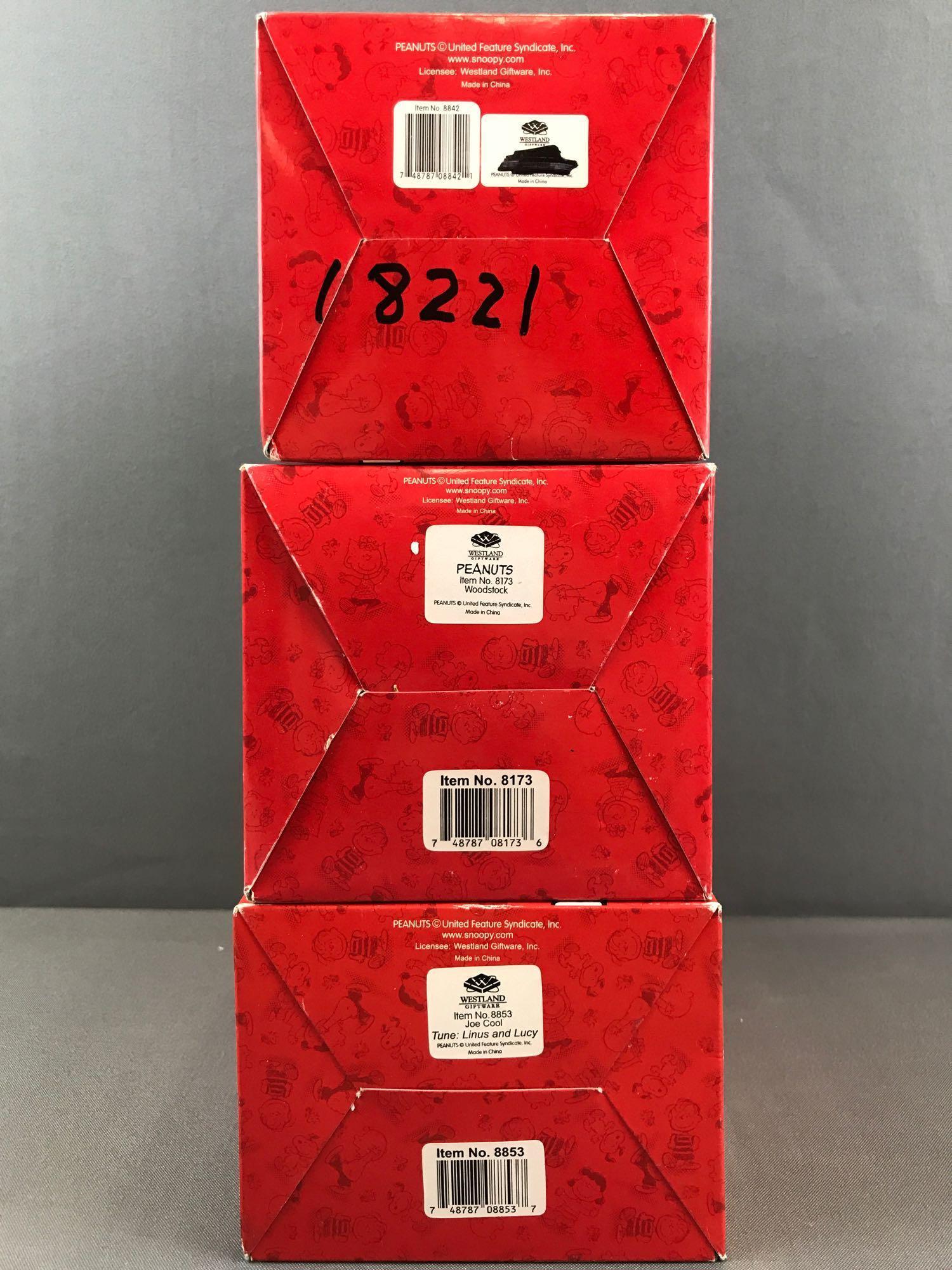 Group of 3 Westland Giftware Peanuts Collection figurines in original packaging