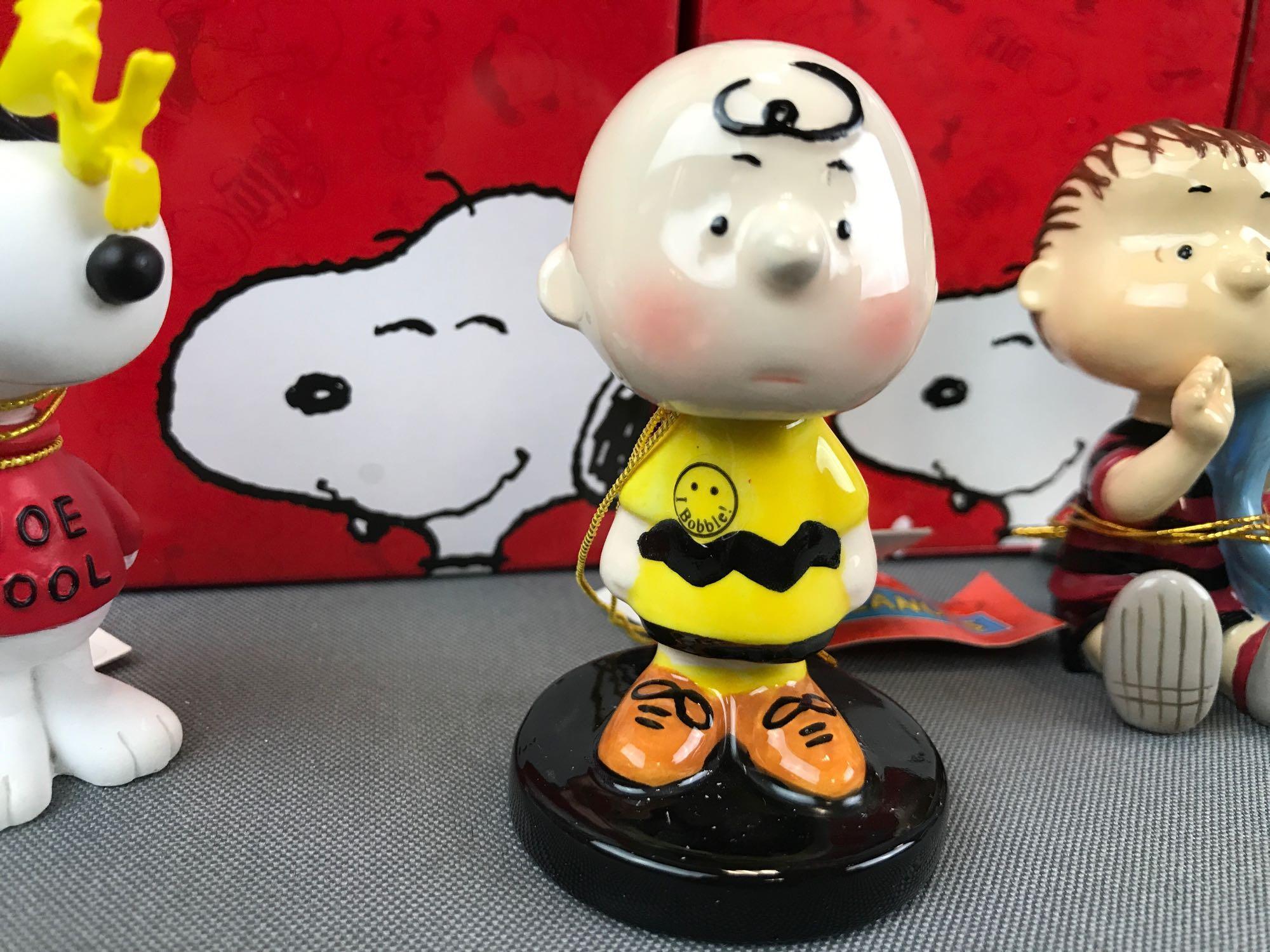 Group of 7 Westland Giftware Peanuts Collection figurines in original packaging