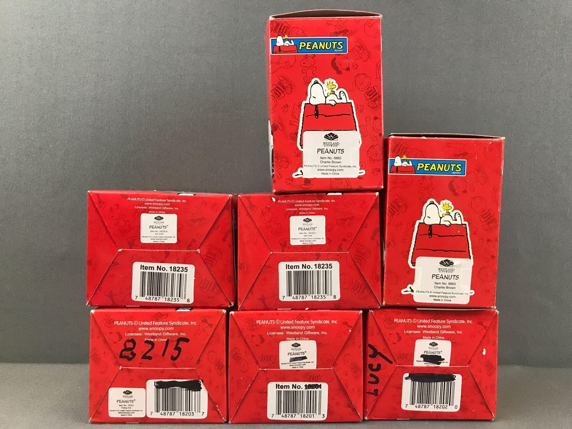 Group of 7 Westland Giftware Peanuts Collection figurines in original packaging