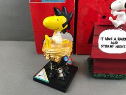 Group of 4 Westland Giftware Peanuts Collection figurines in original packaging