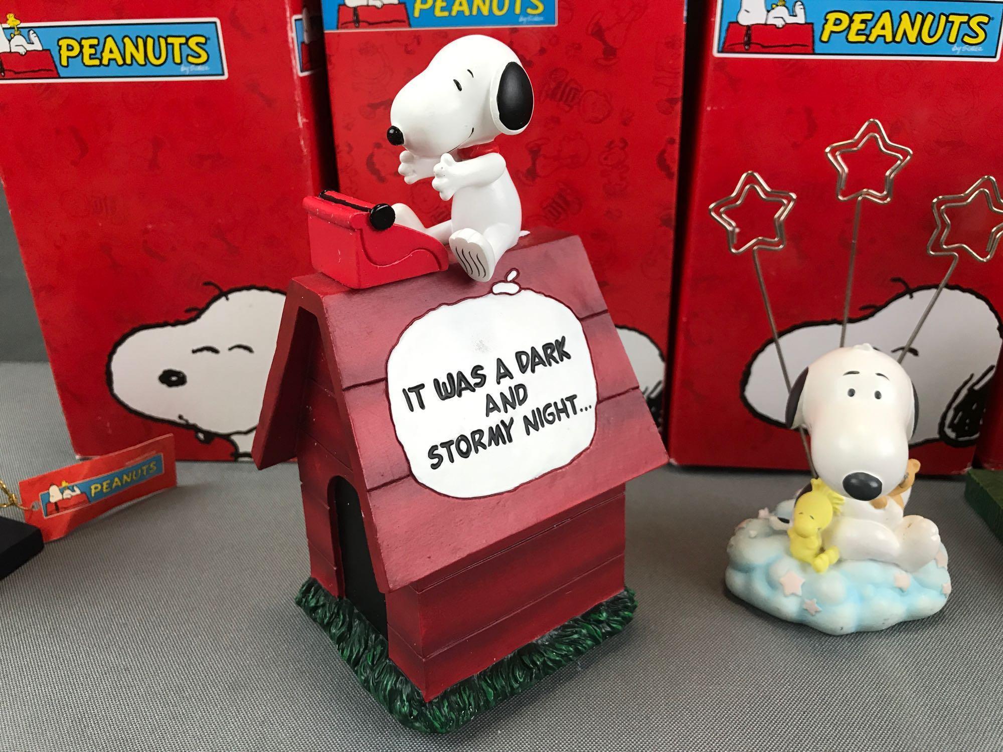 Group of 4 Westland Giftware Peanuts Collection figurines in original packaging