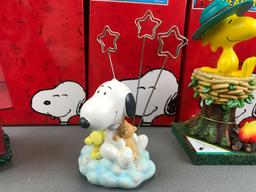 Group of 4 Westland Giftware Peanuts Collection figurines in original packaging
