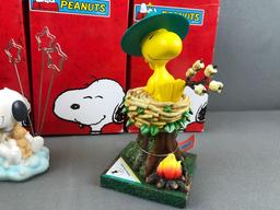 Group of 4 Westland Giftware Peanuts Collection figurines in original packaging