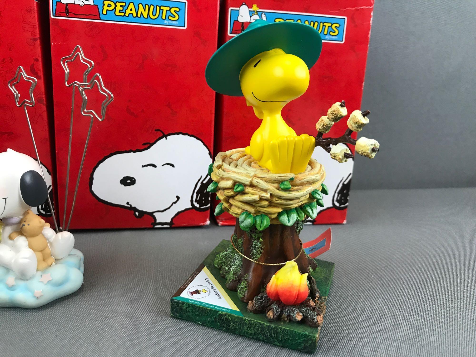Group of 4 Westland Giftware Peanuts Collection figurines in original packaging