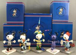 Group of 5 Westland Giftware Peanuts on Parade Snoopy figurines in original packaging