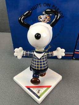 Group of 5 Westland Giftware Peanuts on Parade Snoopy figurines in original packaging
