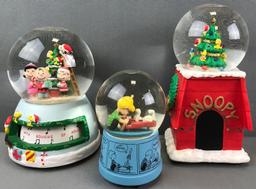 Group of 3 assorted Peanuts Musical Water Globes