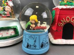 Group of 3 assorted Peanuts Musical Water Globes
