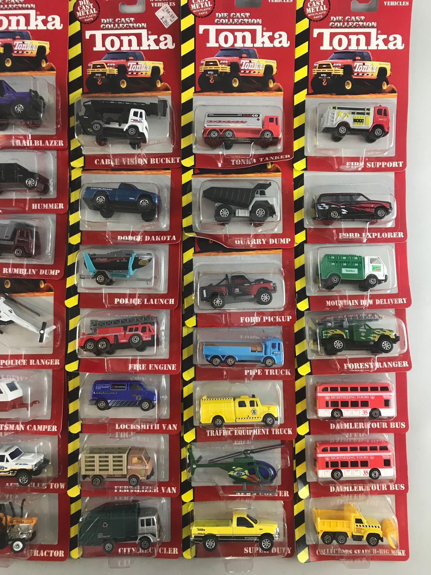 Group of 52 Maisto Tonka Die-Cast Collection Vehicles