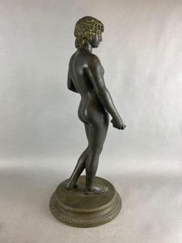 Classical Statue of a Man Holding a Baton