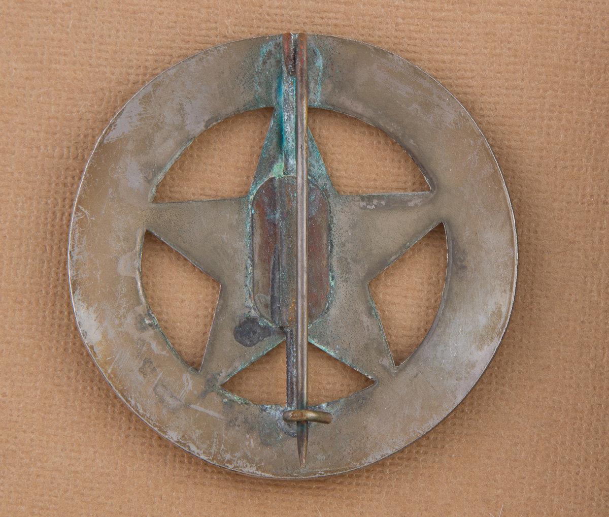 Circle star Badge, "SHERIFF, CONCHO COUNTY, TEXAS",  2 3/4" across, showing nice even wear.  George