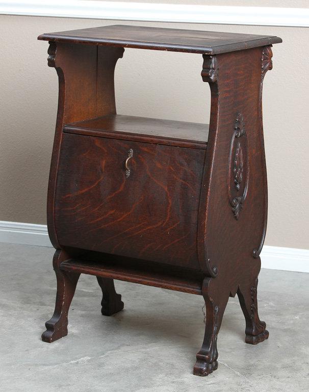 Unique antique, quarter sawn oak Music Cabinet with Bombay front and back, claw feet & lion head cor