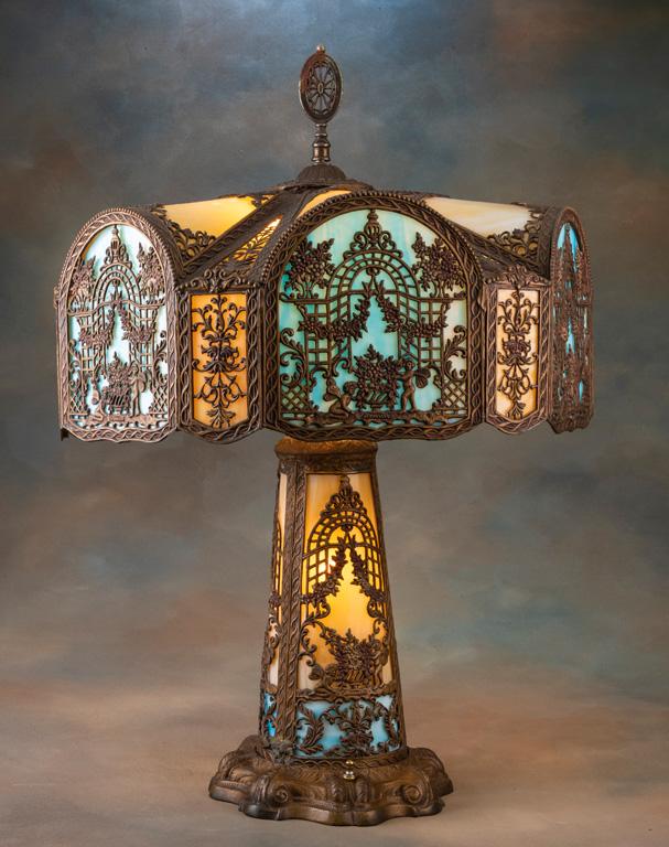 Outstanding antique, bent panel, multi-color stained glass Table Lamp marked "Miller Co.", circa 192