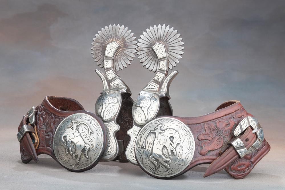 Outstanding pair of double mounted Spurs by noted Texas Bit & Spur Maker Kevin Burns, with raised ha