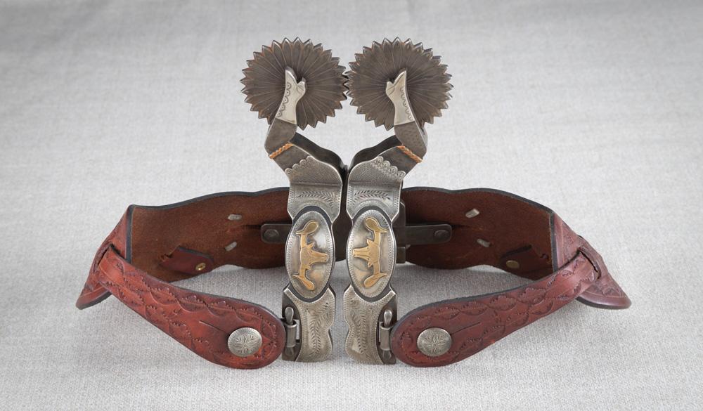 Fancy pair of double mounted gal-leg Spurs by noted Oklahoma Bit and Spur Maker Jerry Wallace.  Spur