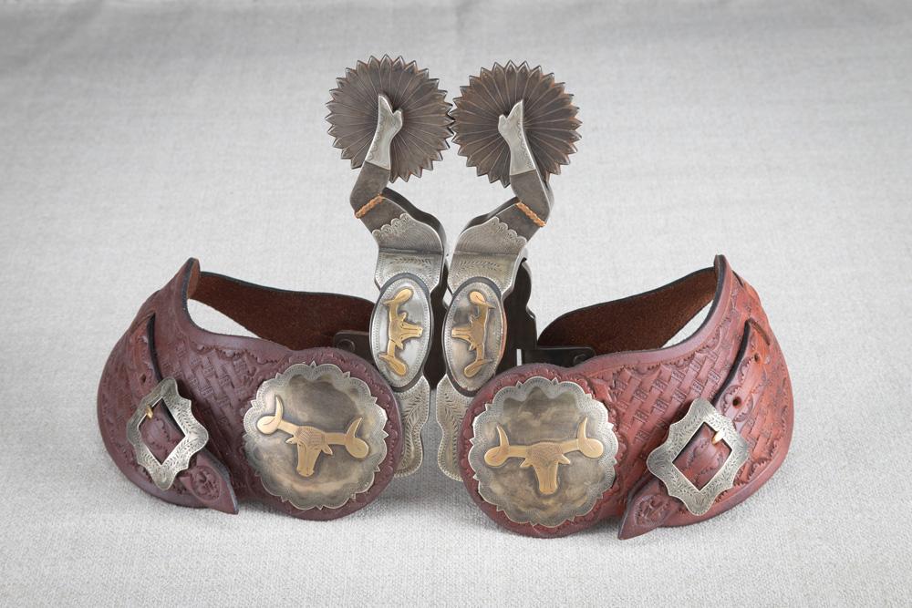 Fancy pair of double mounted gal-leg Spurs by noted Oklahoma Bit and Spur Maker Jerry Wallace.  Spur