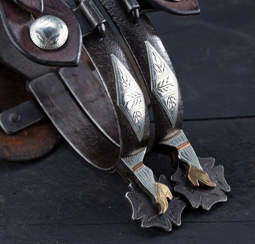 A pair of double mounted Gal-Leg Spurs by noted Oklahoma Bit and Spur Maker Henry Ellis (#220).  NOT