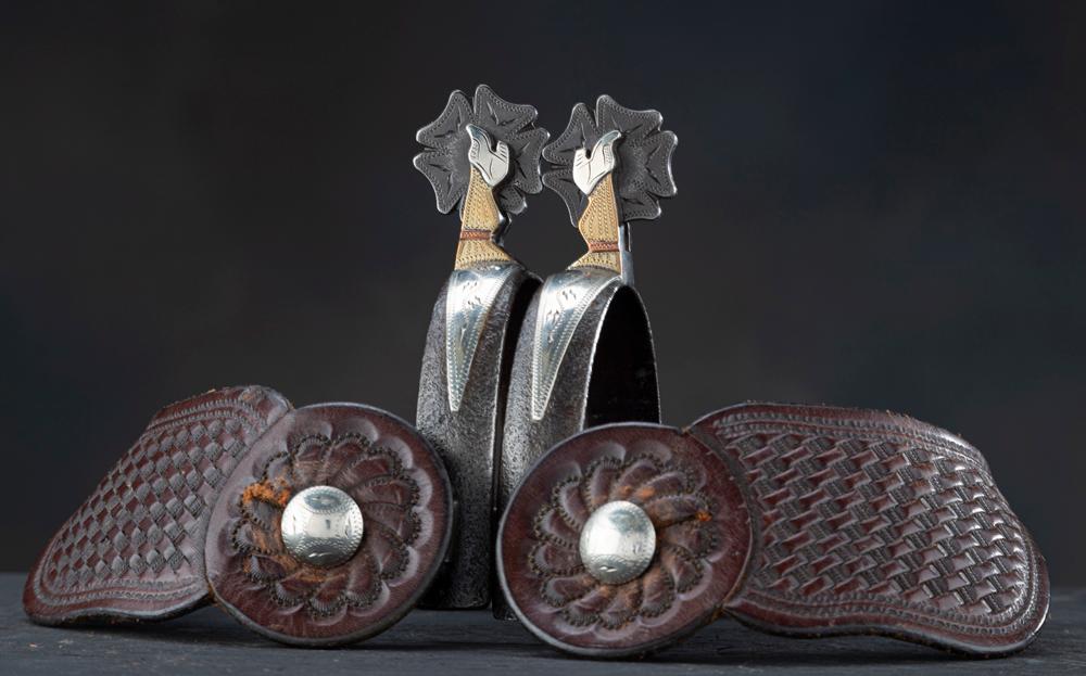 A pair of double mounted Gal-Leg Spurs by noted Oklahoma Bit and Spur Maker Henry Ellis (#220).  NOT