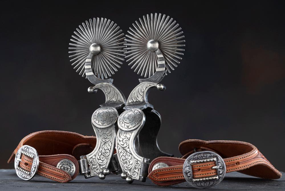 Very showy pair of double mounted, hand engraved, silver overlay Spurs by noted West Bountiful, Utah