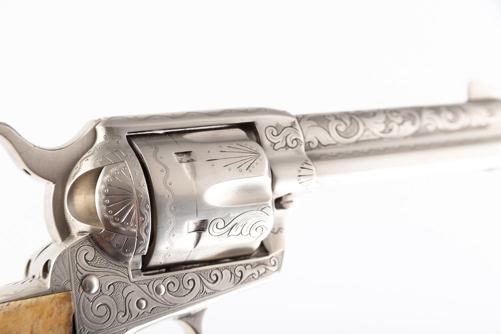 ONE of a pair of matching Colt SAAâ€™s, SN 262AM. This is a tastefully engraved Colt Single Action A